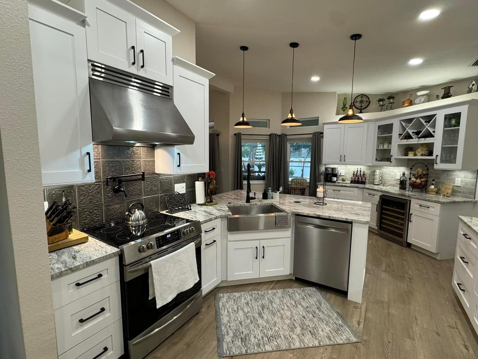 Kitchen remodel with new pendant and recessed lighting installed by Lightning Bay Electric in Riverview, FL