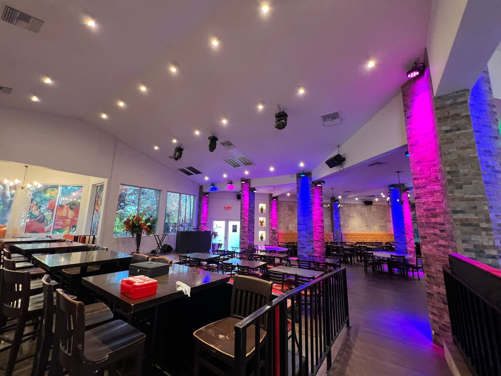 Restaurant and event venue with recessed lighting, color-changing LED accent uplights and stage fixtures installed by Lightning Bay Electric in Tampa, FL